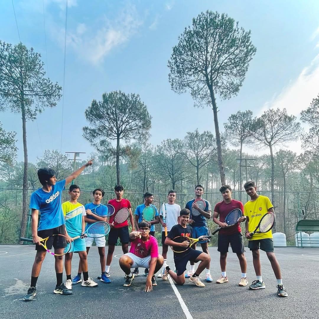 Juniors training together on court